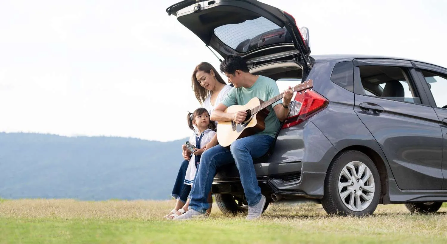 Driver reading through a car insurance policy document